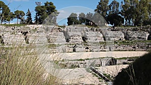 syracuse sicily italy roman amphitheater theater theatre medium shot pan 574 v