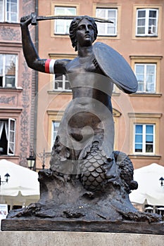 Syrena Siren - Mermaid Statue in Old Town in Warsaw, Poland photo