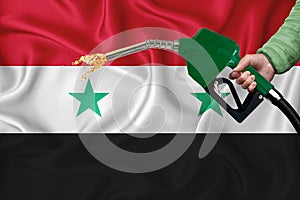 SYRIA flag Close-up shot on waving background texture with Fuel pump nozzle in hand. The concept of design solutions. 3d rendering