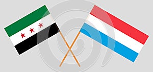 Syria opposition and Luxembourg. The Luxembourgish and Syrian National Coalition flags