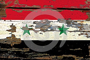 Syrian flag on old wood.