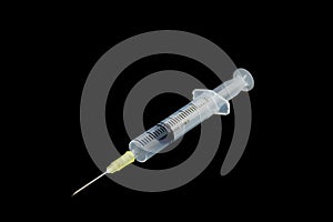 Syring on black background.