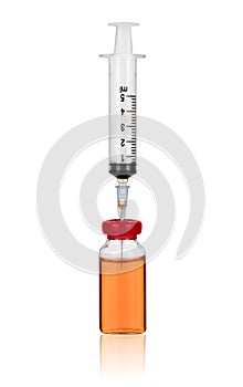 Syringe and ampoule with a vaccine on white