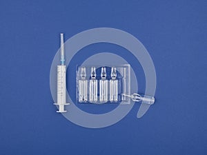 A syringe and ampoules for the treatment of sick people