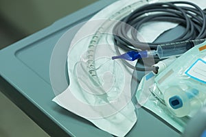 Syringe connected to endotracheal tube on the table