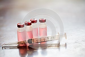 Syringe contained rabies vaccine on table