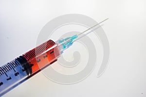 Syringe Containing Red Fluid Blood From Close Up