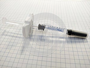 Syringe filled with liquid for injection