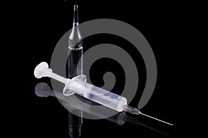 Syringe and glass vial