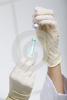 Syringe in hand