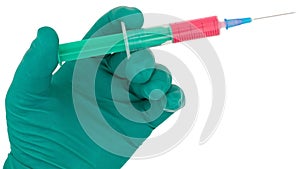 Syringe in hand medical glove medicine