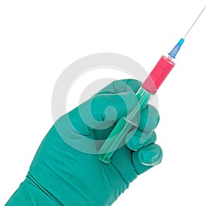 Syringe in hand medical glove medicine