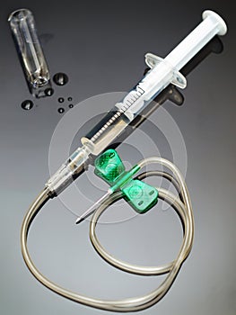 Syringe with infusion unit