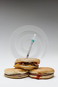 Syringe injected in hamburgers, horizontal