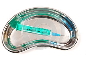 Syringe in Kidney Dish