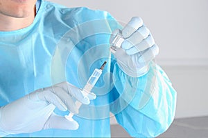 Syringe, medical injection in hand, palm or fingers. Medicine plastic vaccination equipment with needle. Liquid drug