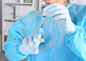 Syringe, medical injection in hand, palm or fingers. Medicine plastic vaccination equipment with needle. Nurse doctor