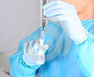 Syringe, medical injection in hand, palm or fingers. Medicine plastic vaccination equipment with needle. Nurse doctor