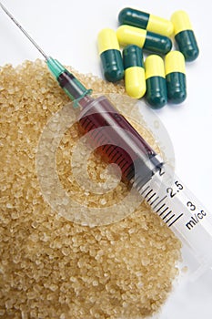 Syringe, needle, drug capsules, crystals