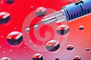 Syringe needle with fluid drops
