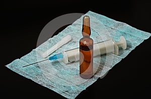 Syringe with the needle on hygienic napkin