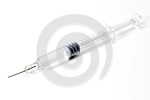 Syringe with needle isolated on white background
