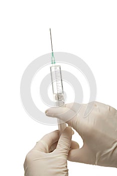 Syringe in nurse hands,isolated