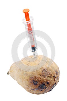 Syringe with old pear.