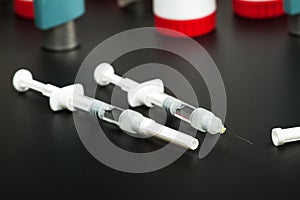 Syringe with an open needle