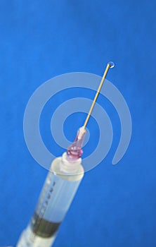 Syringe with sharp needle