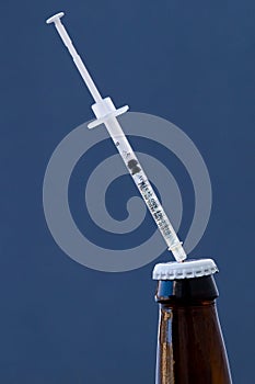 Syringe stuck on beer bottle