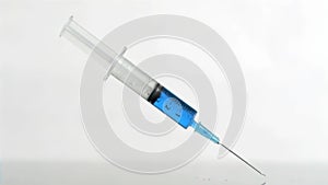 Syringe in a super slow motion rebounding