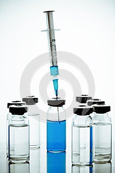 Syringe and vials