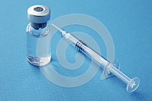 Syringe and vials closeup with selective focus. Medical and Healthcare Concept