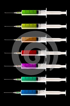 Syringes on a black background. Medical equipment. Vaccination of the population