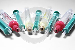 Syringes without needles lying in semicircle