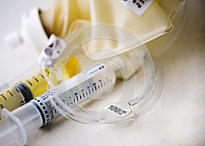 Syringes, tubing and antibiotic infusion