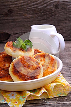 Syrniki (Cottage cheese pancakes, Fritters of cottage cheese)