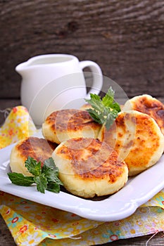 Syrniki (Cottage cheese pancakes, Fritters of cottage cheese)