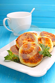 Syrniki (Cottage cheese pancakes, Fritters of cottage cheese)