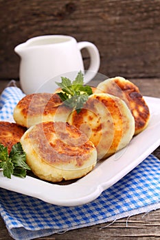 Syrniki (Cottage cheese pancakes, Fritters of cottage cheese)