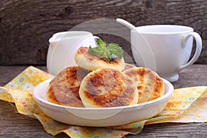 Syrniki (Cottage cheese pancakes, Fritters of cottage cheese)