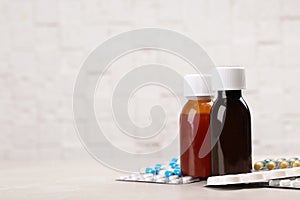 Syrups and different cough remedies on table