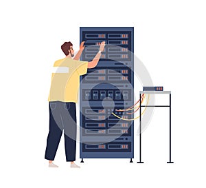 Sysadmin maintaining work of server cabinet, repairing and adjusting network connection. Engineer working with photo
