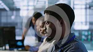 System administrators in data center implementing AI systems