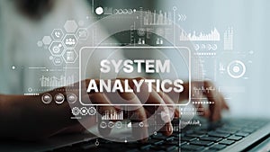 System Analytics Concept with Hands on Keyboard and Data Visualization Elements in a Modern Workspace Setting