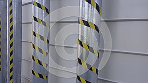 system of anti-intrusion pylons on a metal background