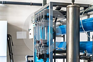 System of automatic treatment and multi-level filtration of drinking water produced from well. Plant or factory for