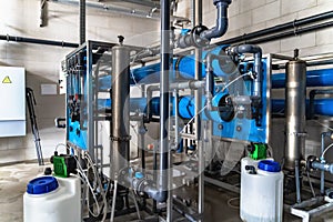 System of automatic treatment and multi-level filtration of drinking water produced from well. Plant or factory for