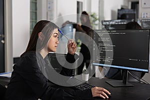 System engineer brainstorming ideas trying to write code